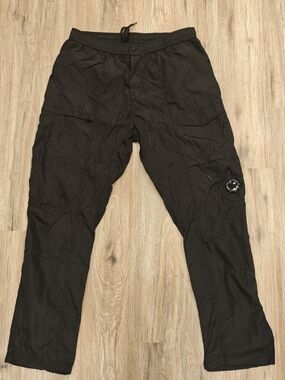 C.P. Company Black Cargo Pants with Signature Lens